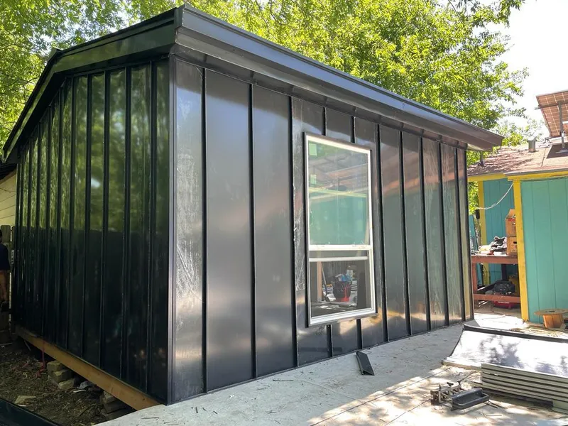 Black standing seam metal wall panels for Metal Roof Installation in Morehead