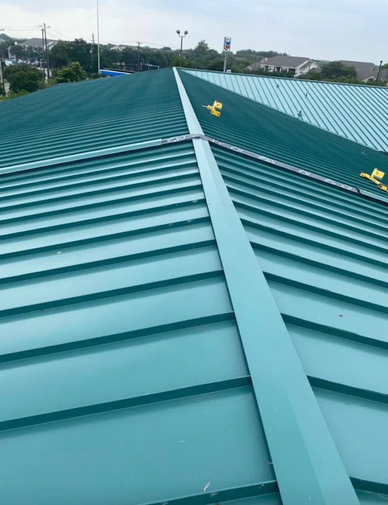 Green commercial metal roof ridge and valley for Metal Roof Repair in Morehead