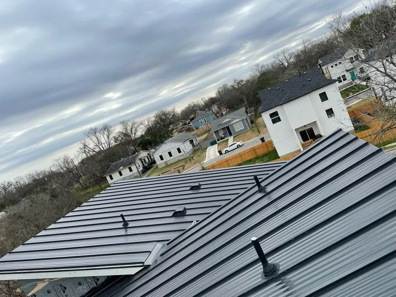 Standing seam metal roof panels with vents for Skylight Repair in Morehead